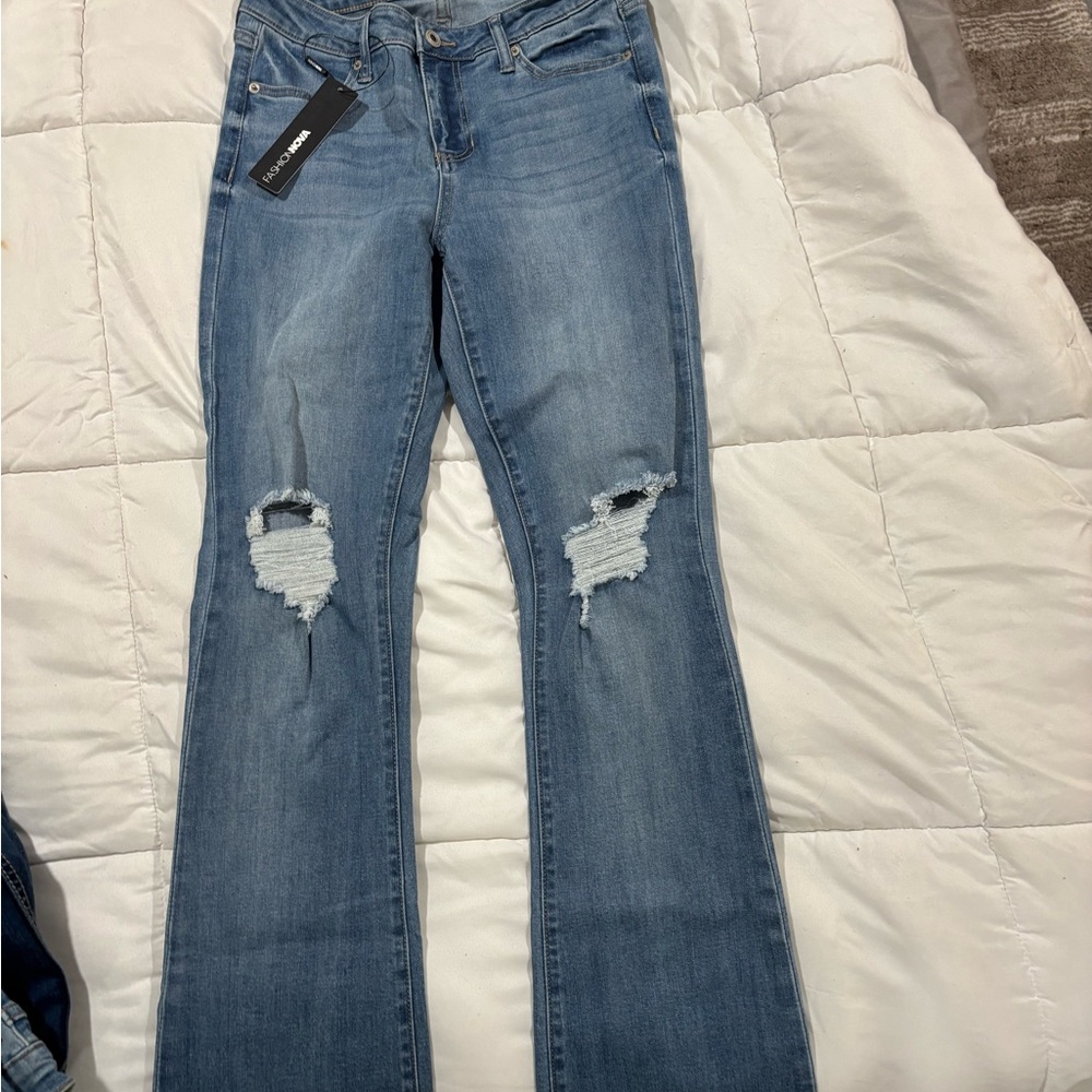 Fashion Nova Blue Boot Cut Jeans with Distressed Details